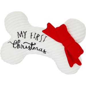 white with a red bow bone shaped dog toy